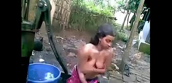  Desi village girl outdoor bath